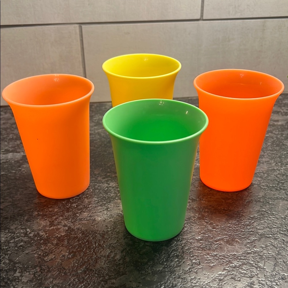 Set of 4 6oz kids cups by Tupperware. Vintage. New without tags. Bold colors